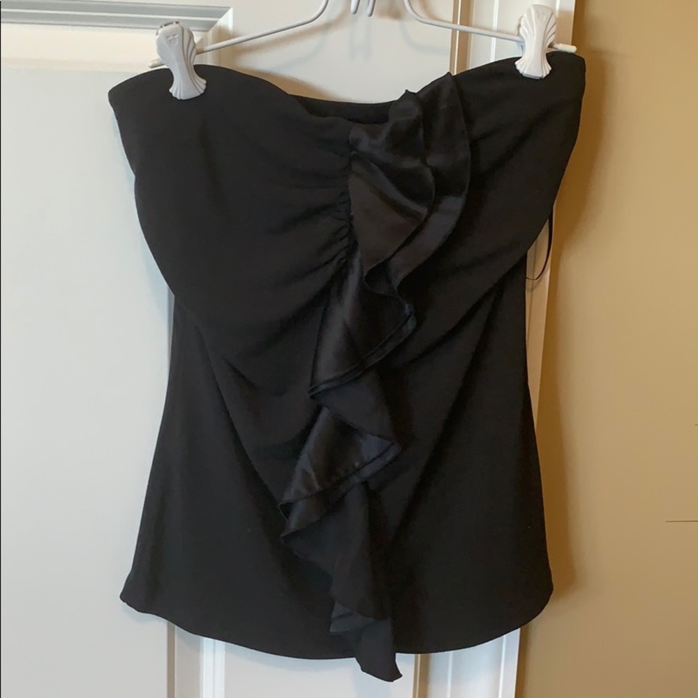 Limited strapless top with ruffle accent